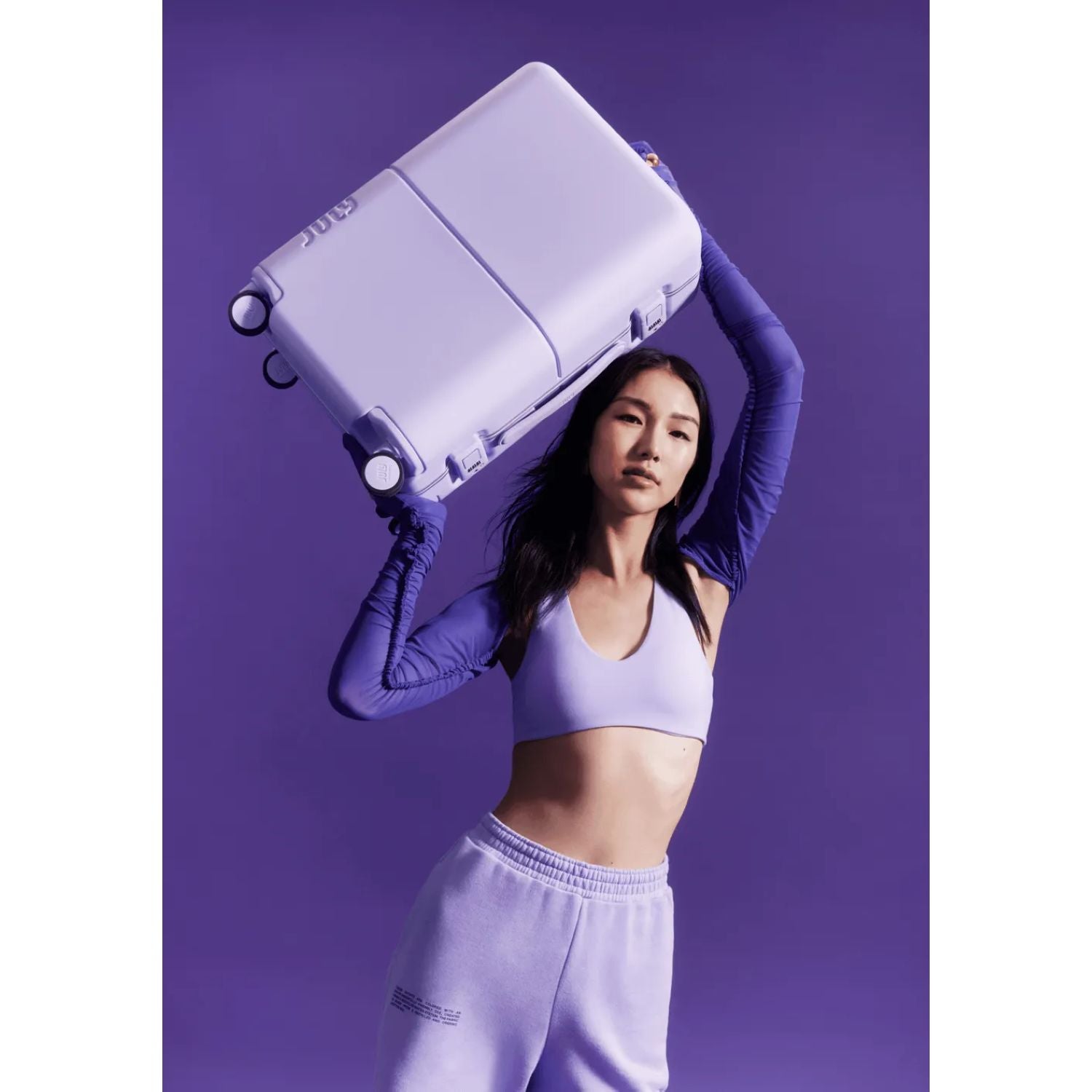 July Carry On Trunk Polycarbonate 21" Luggage With Fast Charge USB-C Cable - Lilac