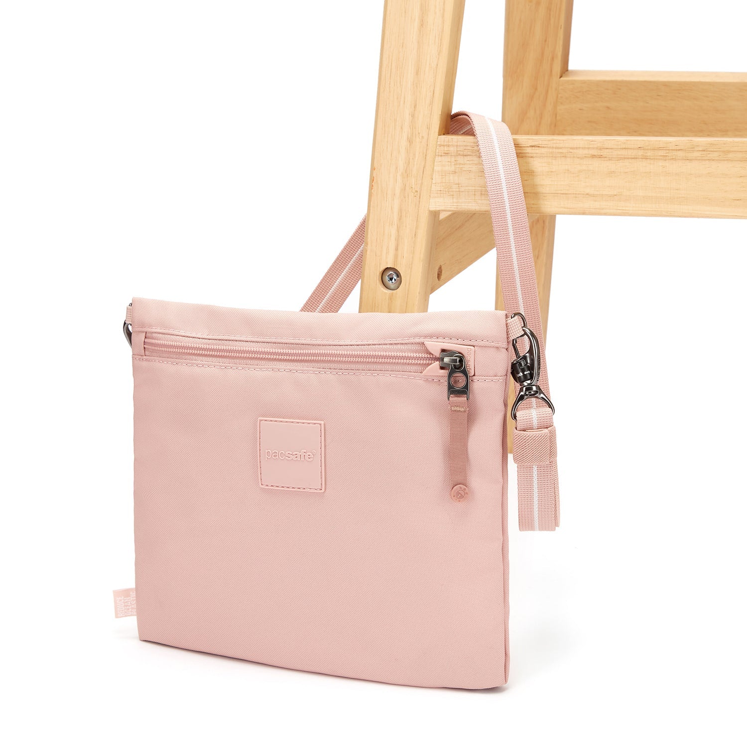 Pacsafe Go Anti-Theft Crossbody Pouch (Sunset Pink)